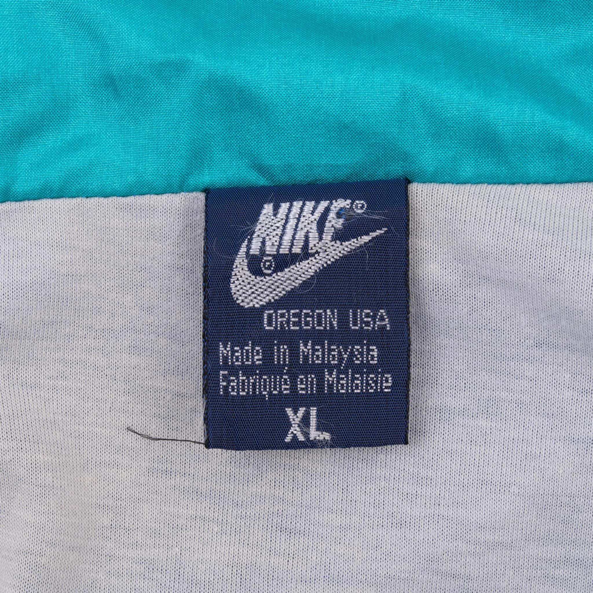 VINTAGE NIKE CLASSIC SWOOSH BLUE WINDBREAKER JACKET 1980S SIZE XL